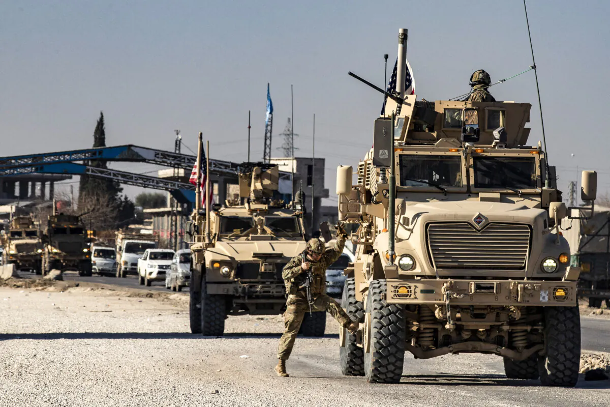 U.S. forces patrol in Syria's northeastern city Qamishli, in the Hasakeh province, mostly controlled by Kurdish-led Syrian Democratic Forces (SDF), on Jan. 9, 2025. (Delil Souleiman / AFP via Getty Images)