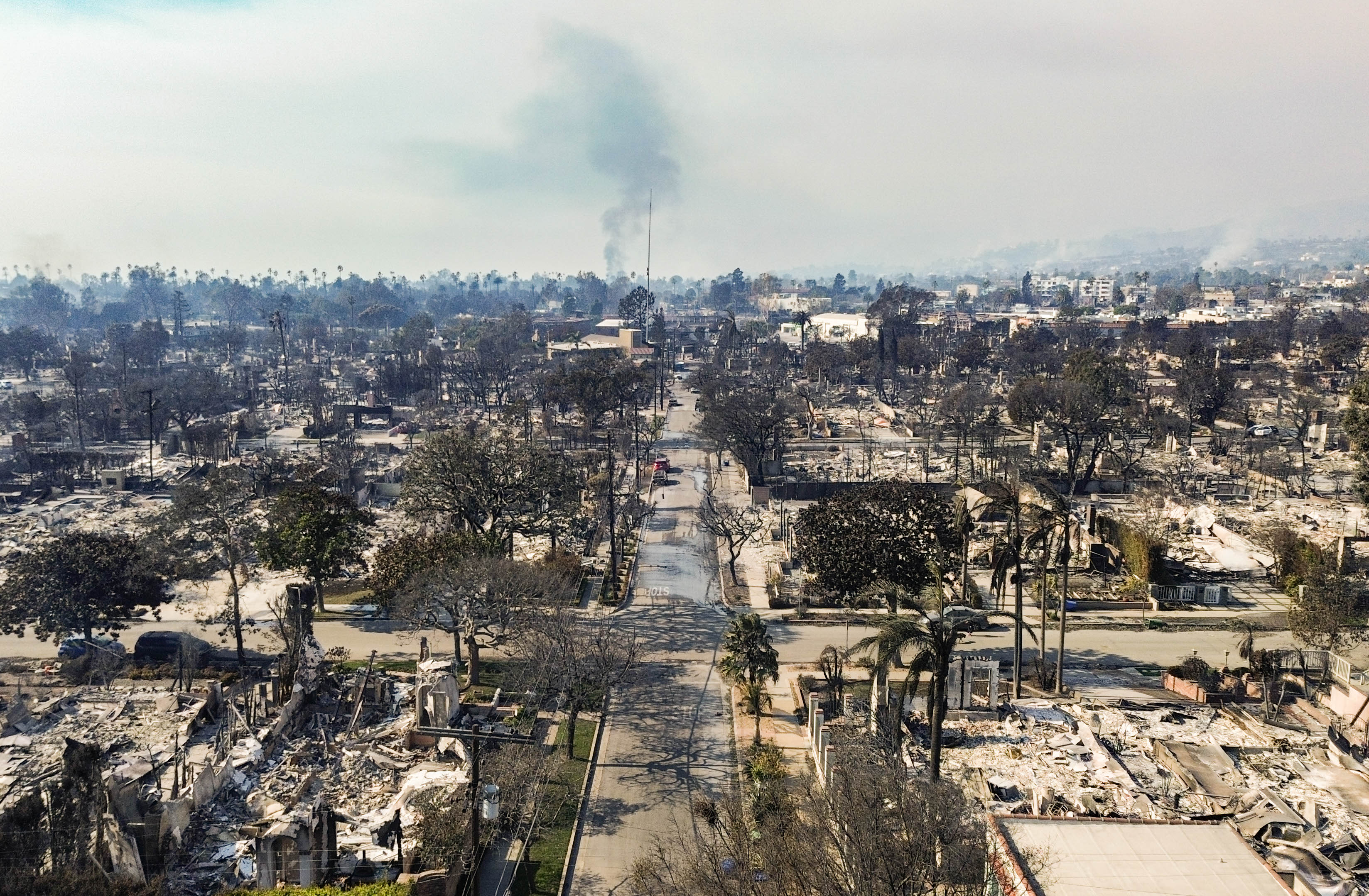 Firefighters Race to Control Los Angeles Wildfires as Tens of Thousands Evacuate