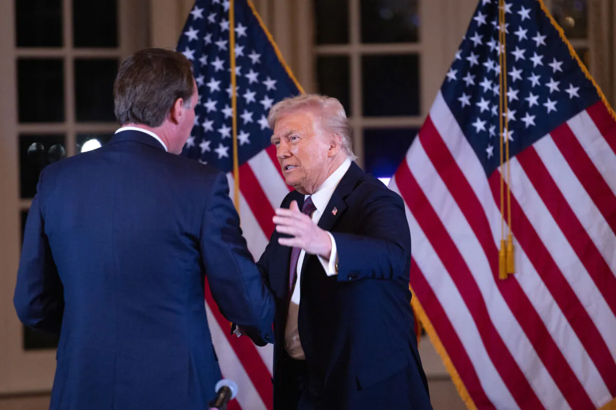 President-elect Donald Trump greets guests as he arrives for a meeting with Republican governors at the Mar-a-Lago Club in Palm Beach, Florida on Jan. 9, 2025. (Scott Olson/Getty Images)
