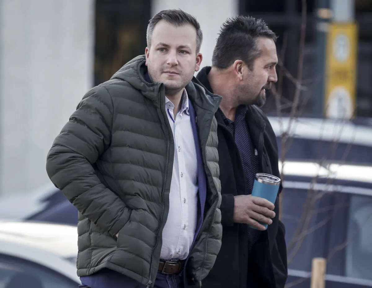 Marco Van Huigenbos (L) and Alex Van Herk arrive at court for a sentencing hearing in Lethbridge, Alberta, Jan. 9, 2025. (The Canadian Press/Jeff McIntosh)
