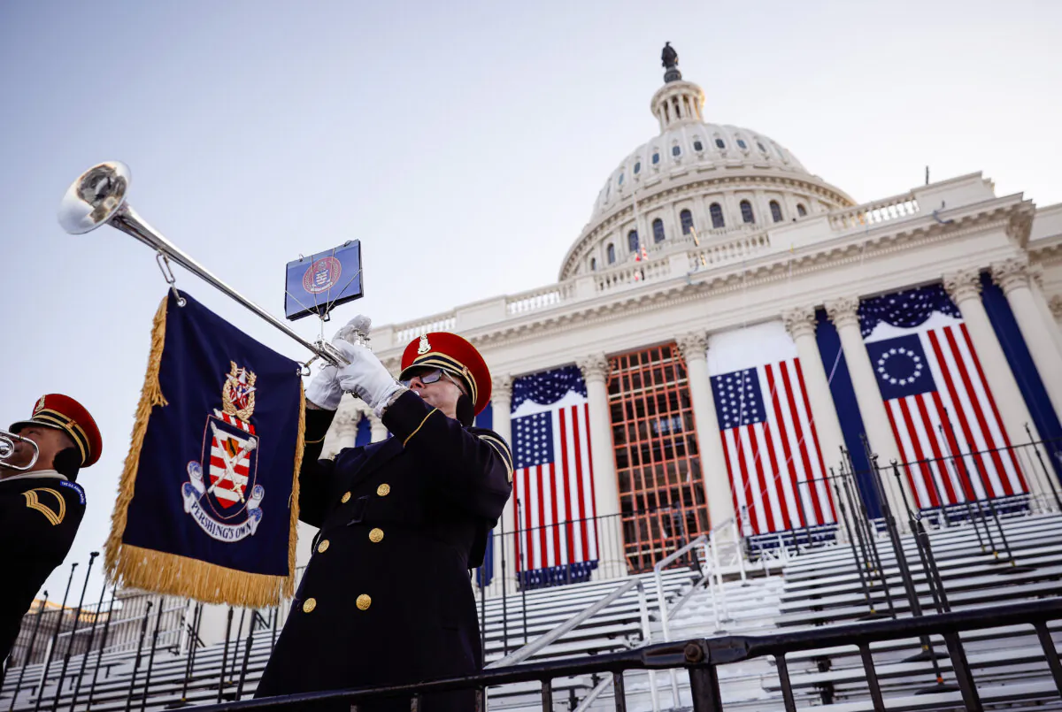 A member of the U.S. Army Herald Trumpets participates in a rehearsal for Inauguration Day on the West Front of the U.S. Capitol in Washington on Jan. 12, 2025. President-elect Donald Trump and Vice President-elect J.D. Vance will be sworn in on Jan. 20. (Kevin Dietsch/Getty Images)