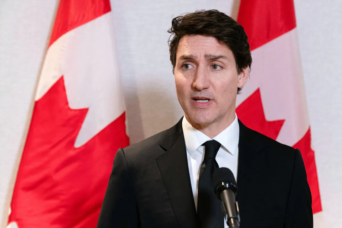Prime Minister Justin Trudeau speaks to the media after a meeting with Jay Timmons, president and CEO of The National Association of Manufacturers, in Washington, D.C., on Jan. 9, 2025. (The Associated Press/Jose Luis Magana)
