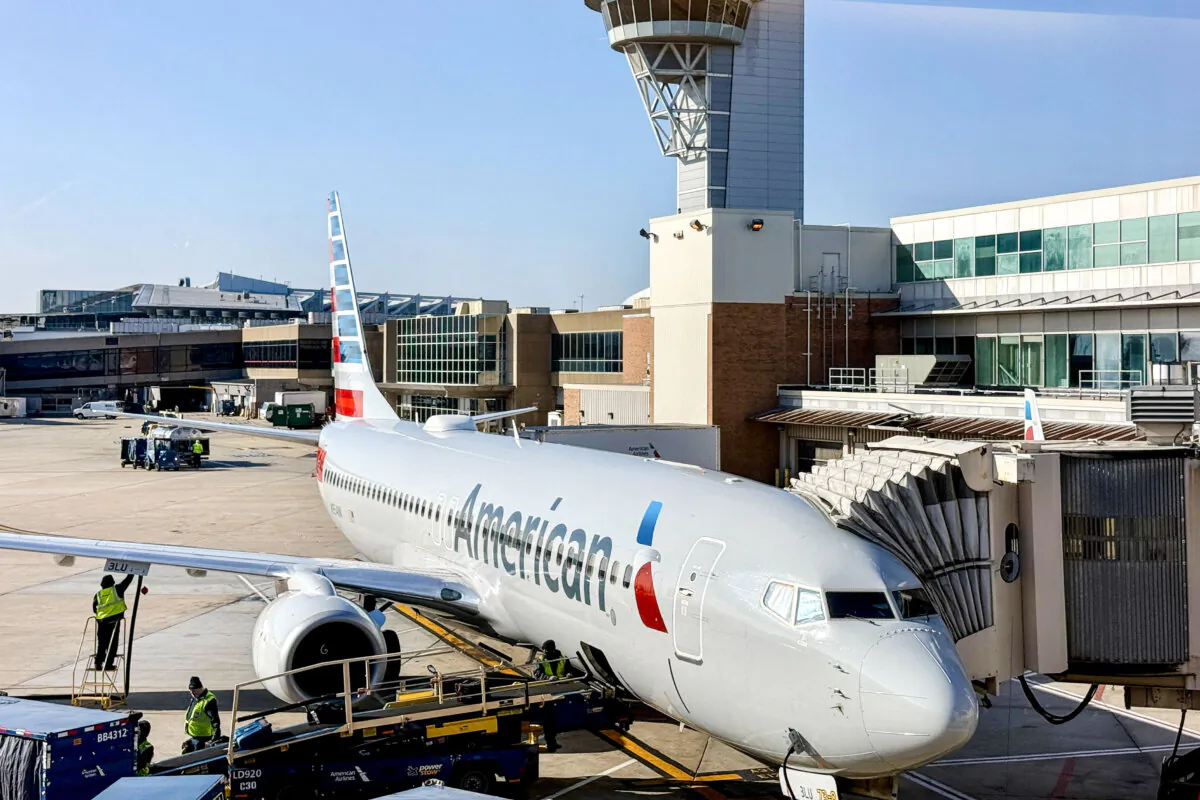 An American Airlines passenger plane is parked at a gate at Philadelphia International Airport on Dec. 13, 2024. (Photo by Daniel SLIM / AFP)