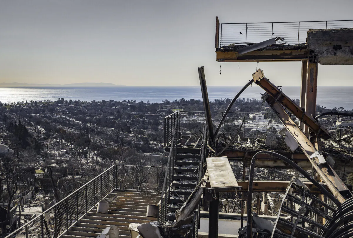 A home with an ocean view reduced to rubble after the Palisades Fire near Los Angeles, on Jan. 13, 2025. (John Fredricks/The Epoch Times)