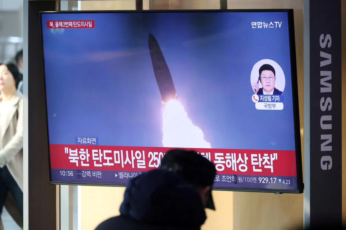 People watch a TV broadcasting a news report on North Korea firing multiple short-range missiles, in Seoul, South Korea, on Jan. 14, 2025. (Kim Hong-Ji/Reuters)