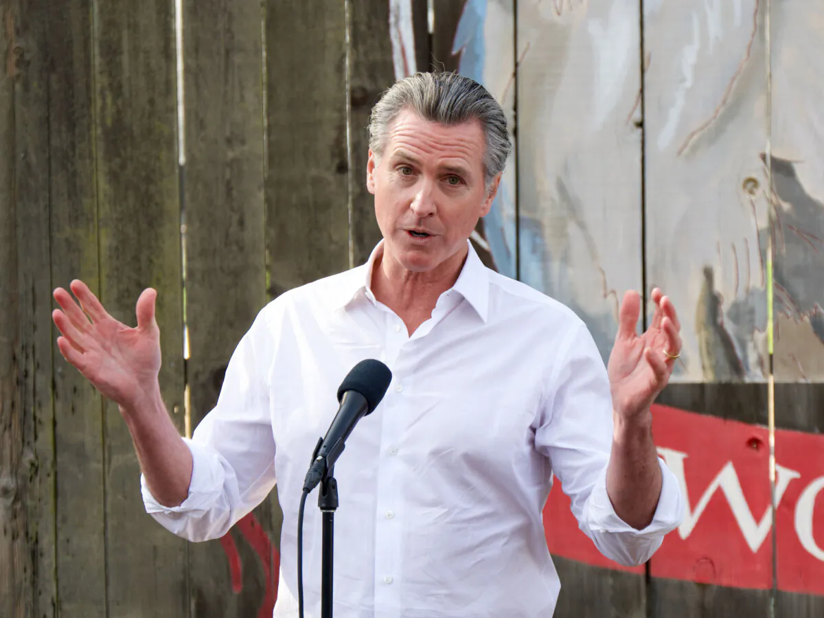 California Gov. Gavin Newsom speaks to reporters at the Davis Ranches in Colusa, Calif., on Dec. 10, 2024. (Travis Gillmore/The Epoch Times)