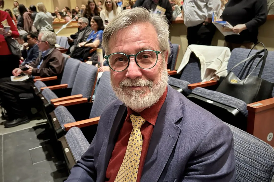 Doug Holt enjoyed Shen Yun's evening performance at the Harris Center on Jan. 14, 2025. (Nan Su/The Epoch Times)