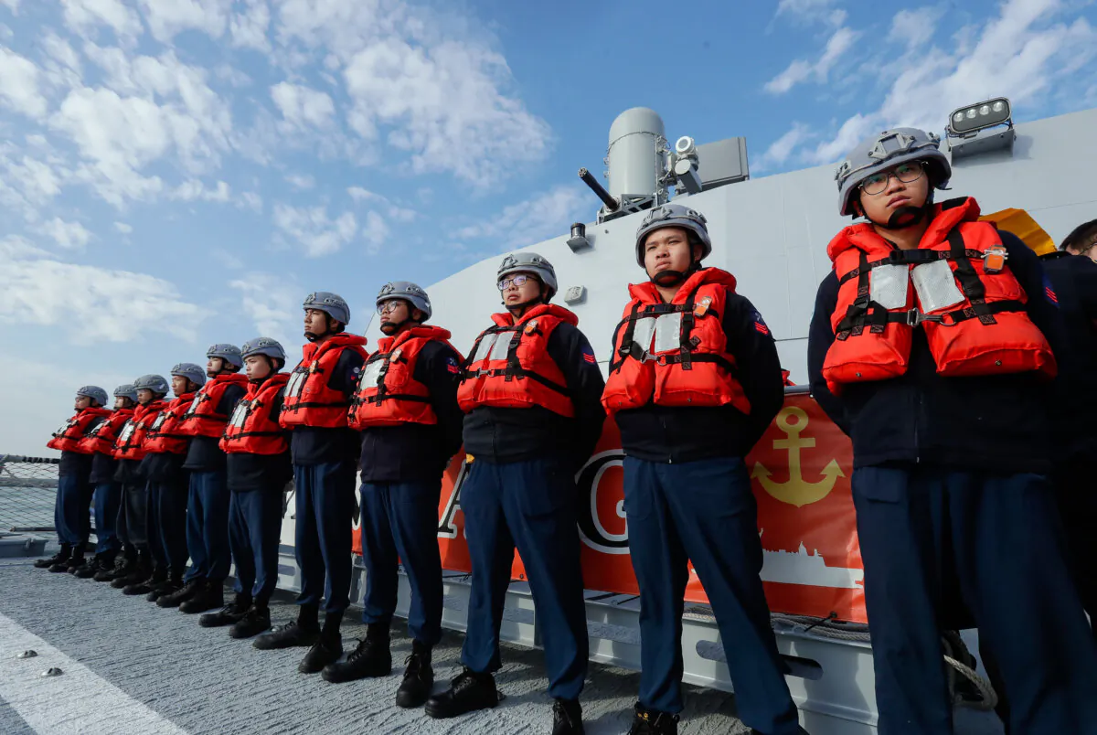 Deck crew of Taiwanese navy stand by on the Tuo Chiang patrol ship during a simulated attack drill off Kaohsiung City, southern Taiwan, on Jan. 9, 2025. (Chiang Ying-ying/AP)
