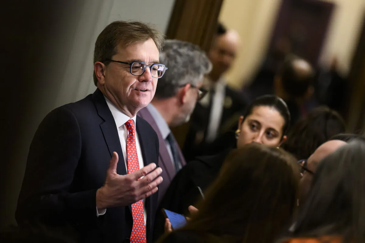 Minister of Energy and Natural Resources Jonathan Wilkinson speaks with journalists before a Liberal Party caucus meeting in West Block on Parliament Hill, in Ottawa, on Jan. 8, 2025. (The Canadian Press/Justin Tang)