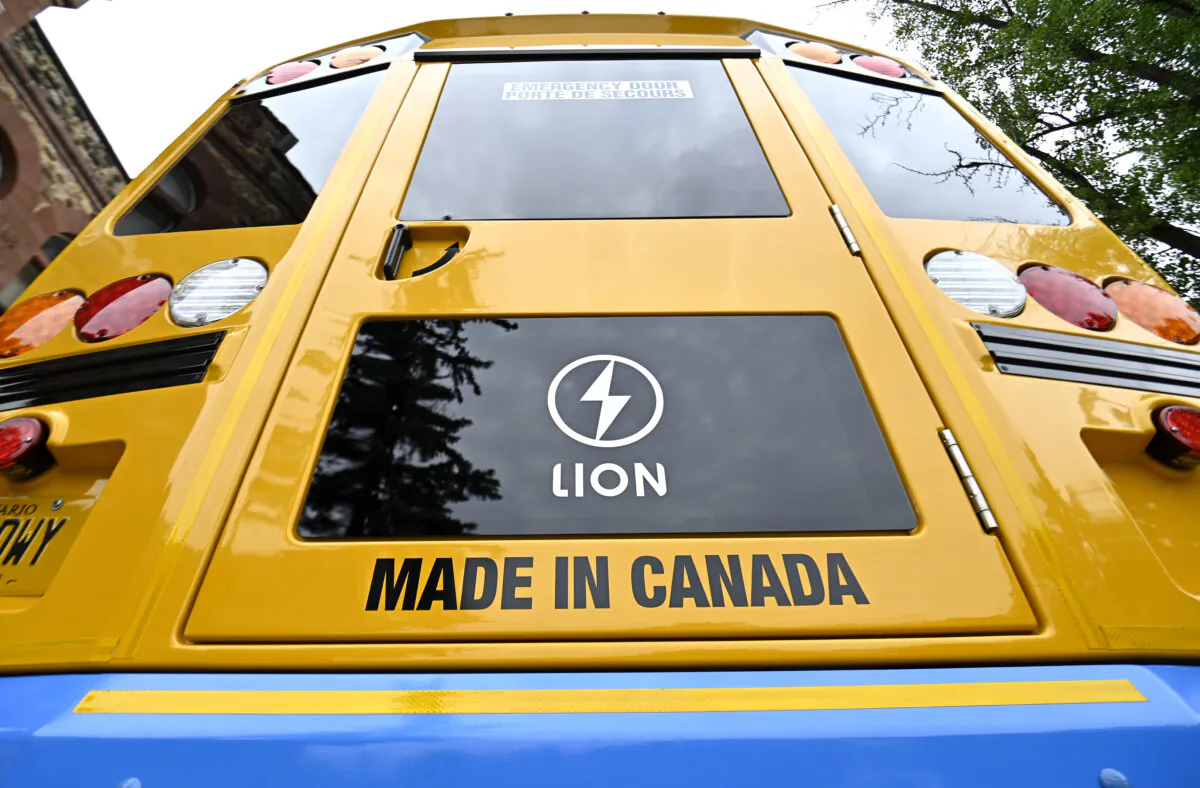 A LionC fully electric school bus is seen at an event promoting the Greening Government Fund, which provides funding to federal departments and agencies to reduce greenhouse gas emissions in their operations, in Ottawa, on June 27, 2023. (The Canadian Press/Justin Tang)