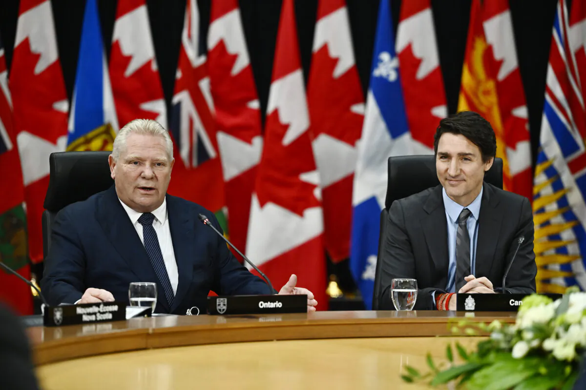 Ontario Premier Doug Ford (L) speaks as Prime Minister Justin Trudeau looks on during a first ministers meeting in Ottawa on Jan. 15, 2025. (The Canadian Press/Justin Tang)