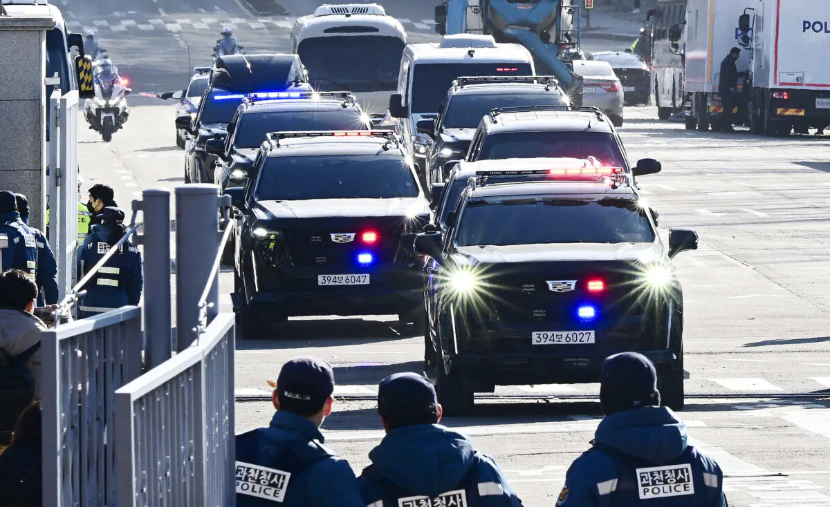 A motorcade believed to be carrying impeached South Korean President Yoon Suk Yeol is seen in Seoul, South Korea, on Jan. 15, 2025. (Korea Pool/Getty Images)