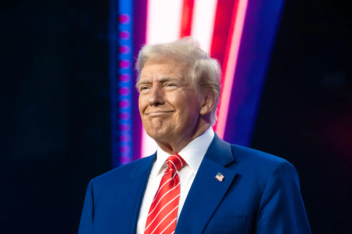 President-elect Donald Trump smiles during Turning Point USA's AmericaFest at the Phoenix Convention Center in Phoenix on Dec. 22, 2024. (Rebecca Noble/Getty Images)