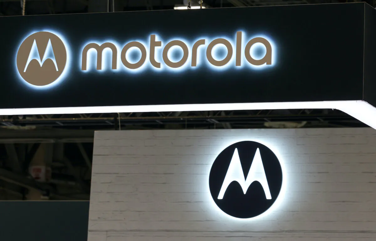 A sign and logos are displayed at the Motorola booth during CES 2024 at The Venetian Convention & Expo Center in Las Vegas on Jan. 9, 2024. (Ethan Miller/Getty Images)