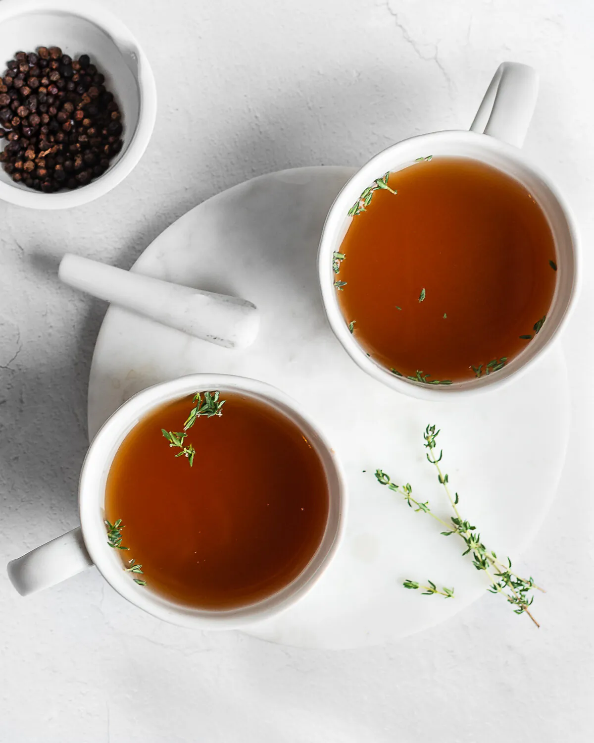 A dash of red wine, in place of the typical vinegar, gives this bone broth a deeper flavor. (Jennifer McGruther)