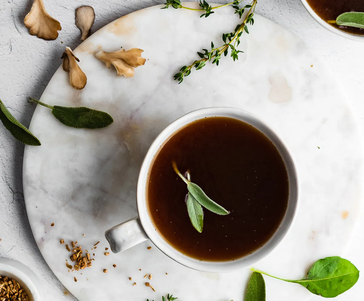 A medley of traditional herbs infuses this savory chicken and mushroom broth. (Jennifer McGruther)