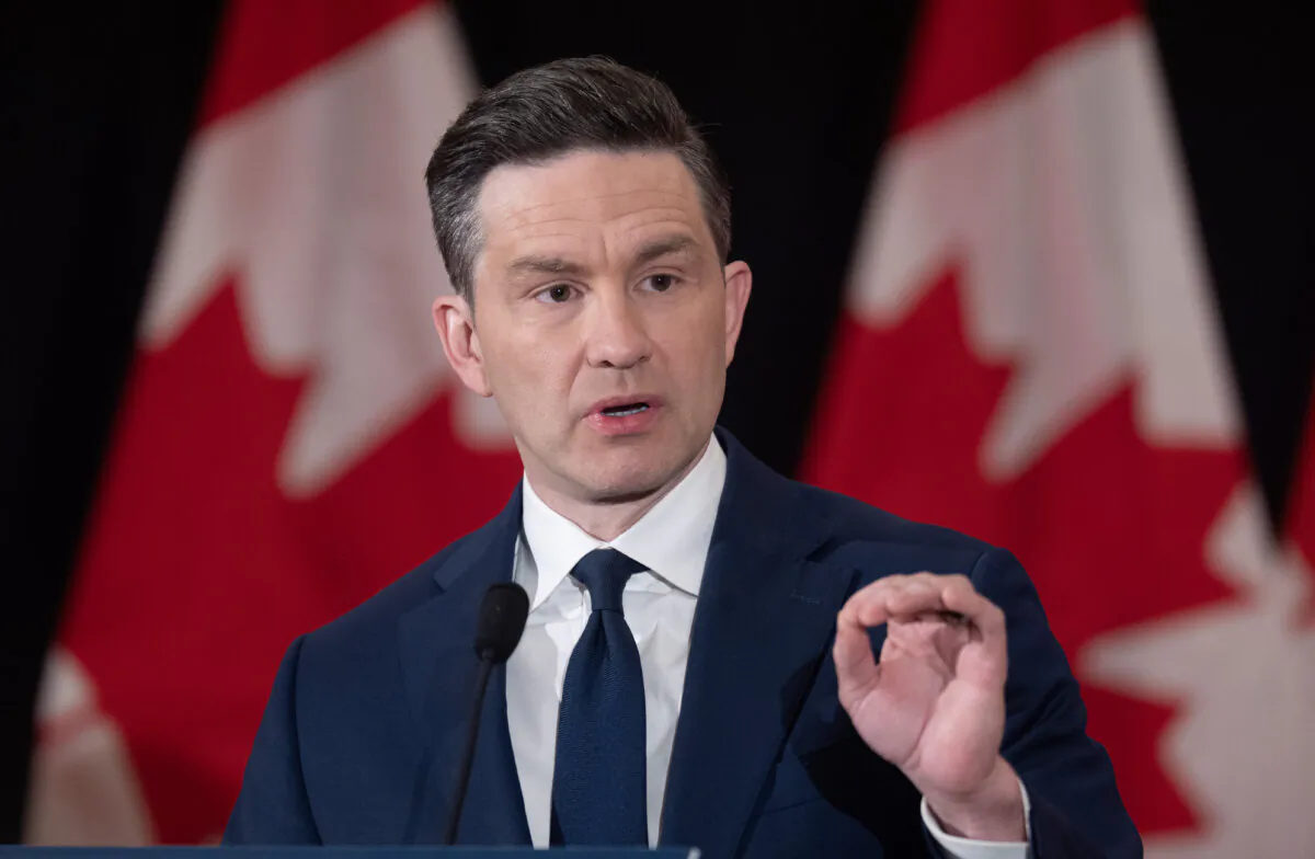 Conservative Leader Pierre Poilievre speaks with reporters at a news conference in Ottawa on Jan. 9, 2025. (The Canadian Press/Adrian Wyld)