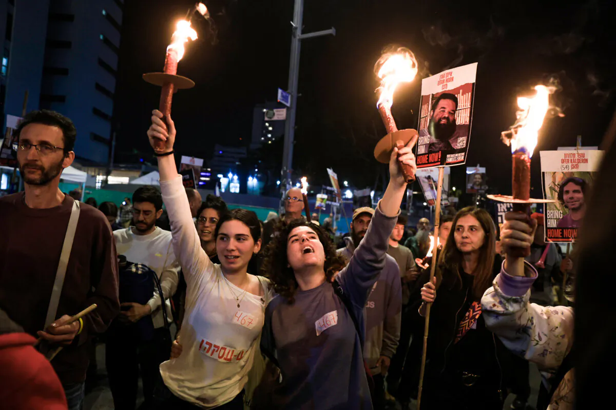 Protesters calling for the return of hostages held in the Gaza Strip react after a cease-fire and hostage release deal was reached in Tel Aviv, Israel, on Jan. 15, 2025. (Amir Levy/Getty Images)