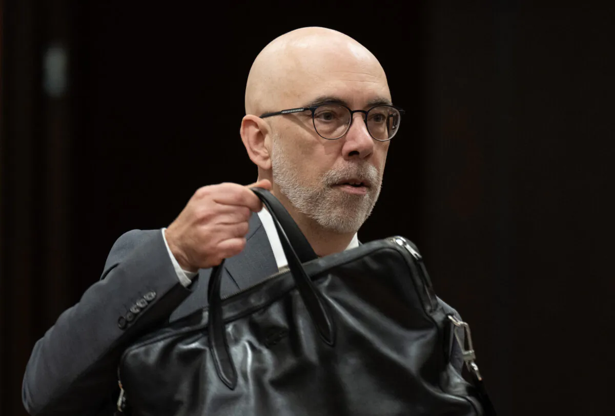 Parliamentary Budget Officer Yves Giroux waits to appear at the Standing Committee on Natural Resources on Parliament Hill in Ottawa on Nov. 18, 2024. (The Canadian Press/Adrian Wyld)