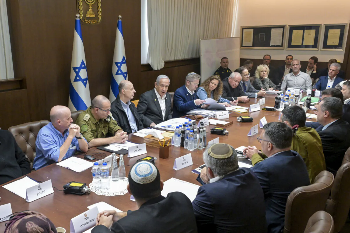 Israeli Prime Minister Benjamin Netanyahu, convened his security Cabinet to vote on a ceasefire deal after confirming an agreement had been reached that would pause the 15-month war with Hamas in Gaza, in Jerusalem, Israel, on Jan. 17, 2025. (Koby Gideon/Israeli Government Press Office via AP)