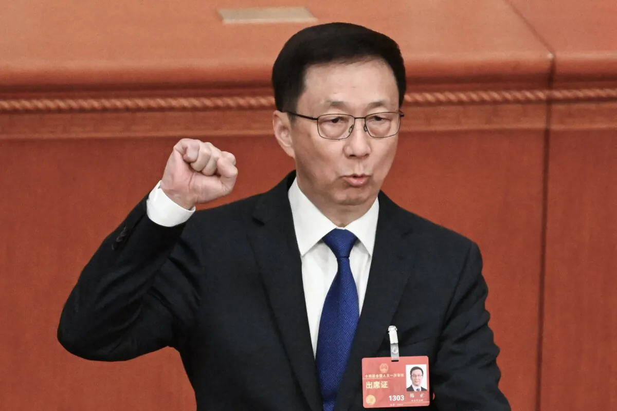 Han Zheng takes an oath after being selected as China's Vice President during the third plenary session of the National People's Congress (NPC) at the Great Hall of the People in Beijing on March 10, 2023. (NOEL CELIS/AFP via Getty Images)