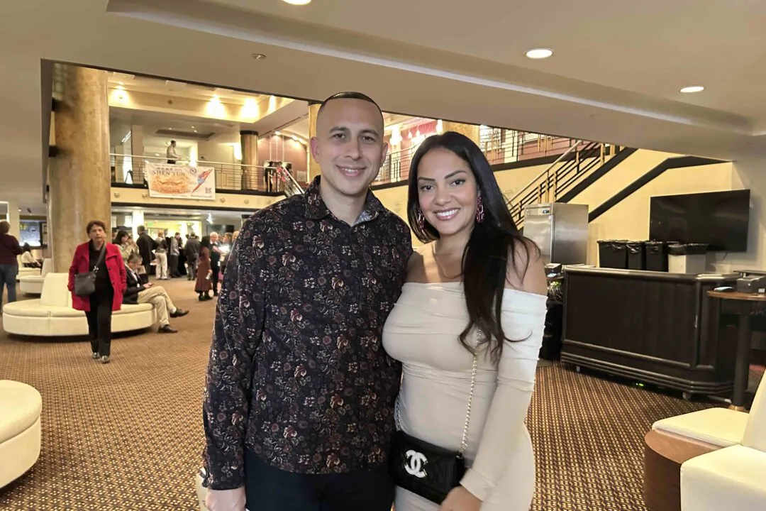 Esteban and Gabriella Russi (R) enjoyed Shen Yun’s evening performance at Duke Energy Center for the Arts on Jan. 17, 2025. (Teng Dongyu/The Epoch Times)
