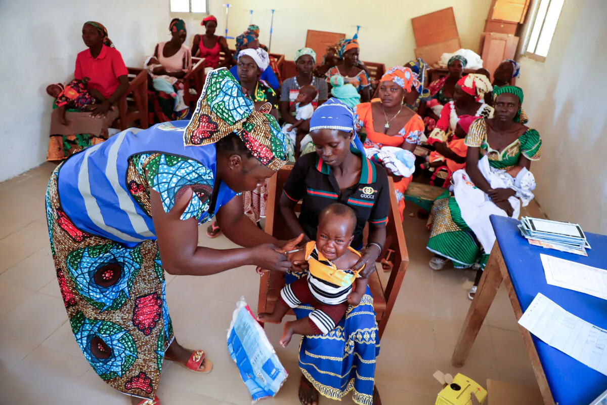 A nurse administers a malaria vaccine to an infant at the health center in Datcheka, Cameroon, on Jan. 22, 2024. (Desire Danga Essigue/Reuters)