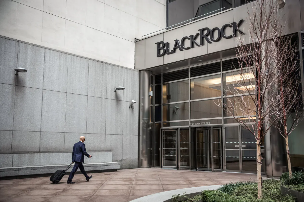 A man walks into the BlackRock offices in New York City on Jan. 16, 2014. (Andrew Burton/Getty Images)