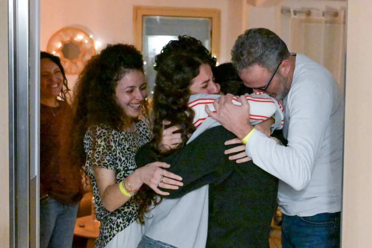 Romi Gonen reunites with loved ones after she was released by Hamas terrorists, in Ramat Gan, Israel, on Jan. 19, 2025. (Maayan Toaf/GPO/Handout via Reuters)