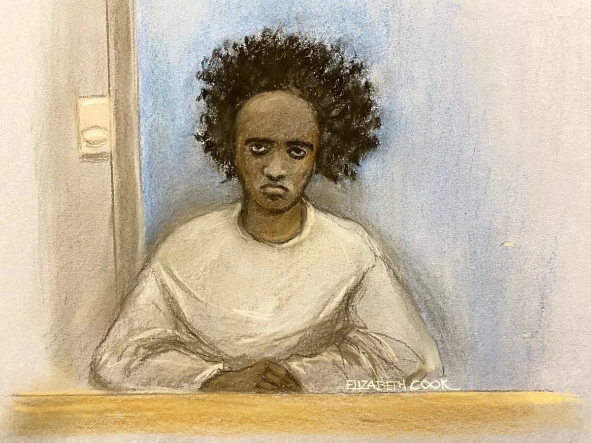Court artist sketch of Southport stabbings suspect Axel Rudakubana, 18, appearing via videolink during a preparatory hearing at Liverpool Crown Court on Dec. 18, 2024. (PA)