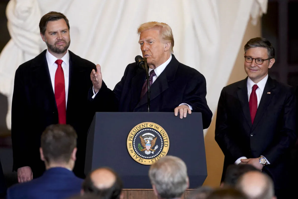 President Donald Trump speaks as Vice President JD Vance looks on in Emancipation Hall after being sworn in as the 47th President of the United States in the U.S. Capitol in Washington on Jan. 20, 2025. (Alexander Drago/Pool/AFP via Getty Images)