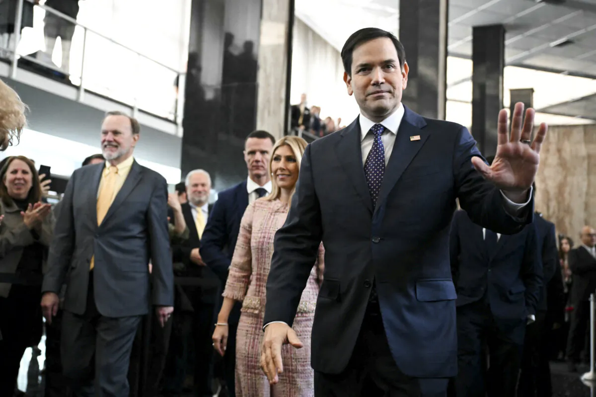 U.S. Secretary of State Marco Rubio and his wife Jeanette Rubio arrive to speak to employees upon arrival at the State Department in Washington, D.C., on Jan. 21, 2025. (Andrew Caballero-Reynolds/AFP via Getty Images)