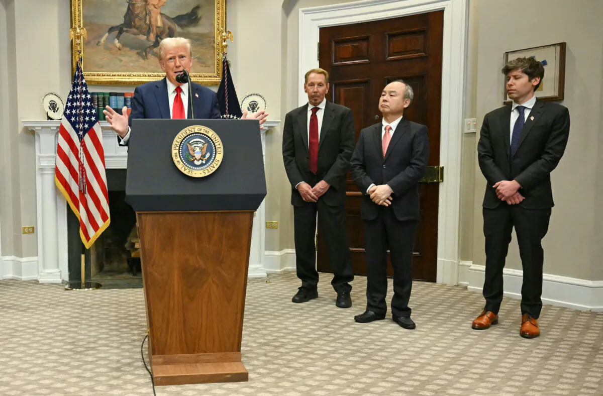 President Donald Trump speaks in the Roosevelt Room flanked by Masayoshi Son (2R), chairman and CEO of SoftBank Group Corp., Larry Ellison (2L), executive chairman of Oracle and Sam Altman (R), CEO of Open AI at the White House on Jan. 21, 2025. (Jim Watson/AFP via Getty Images)