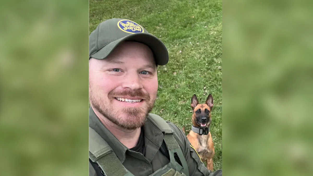 U.S. Border Patrol agent David Maland and his K9 partner, Cora in a file photo. (David Maland/Joan Maland via AP)