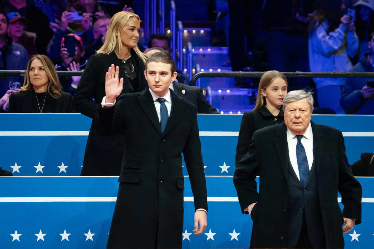 President Donald Trump’s son, Barron Trump, and other family members during the Inaugural Parade at the Capital One Arena in Washington on Jan. 20, 2025. (Madalina Vasiliu/The Epoch Times)