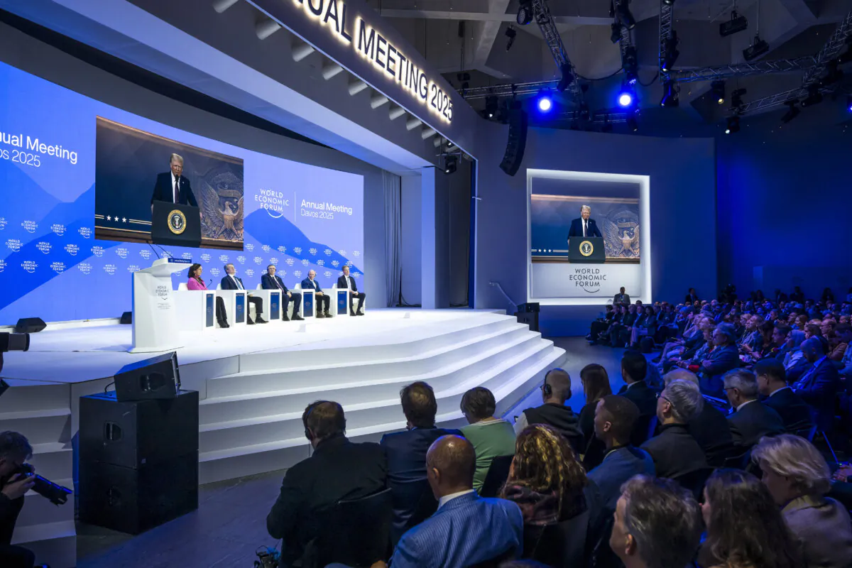 President Donald Trump is seen on a large screen during his address by video conference at the World Economic Forum annual meeting in Davos, Switzerland, on Jan. 23, 2025. (Fabrice Coffrini/AFP via Getty Images)