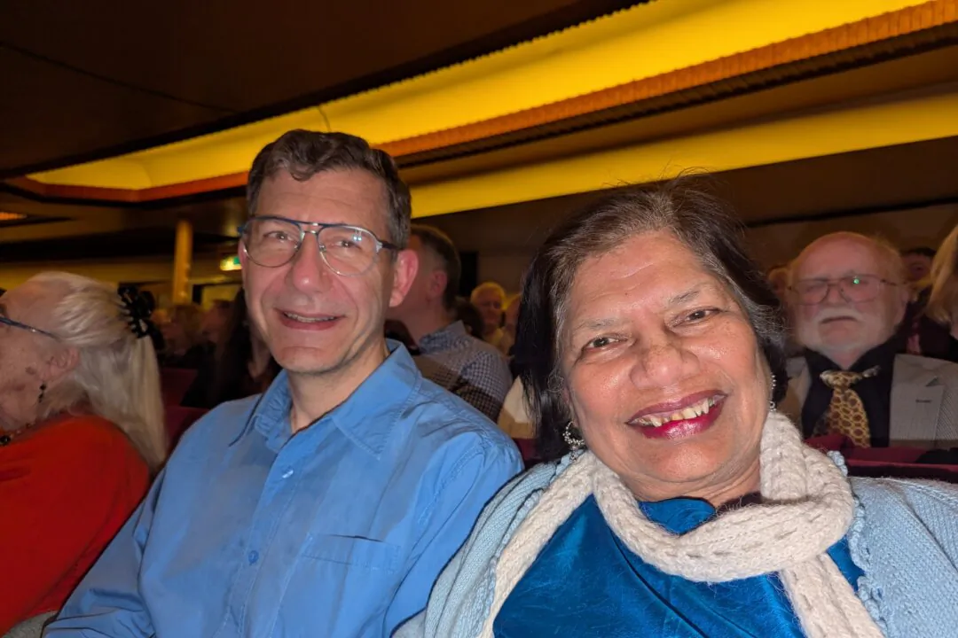 Christian and Kamna Pruvost attend Shen Yun Performing Arts at the New Theatre in Oxford, UK on Jan. 23, 2025. (Chloe Hsiao/The Epoch Times)