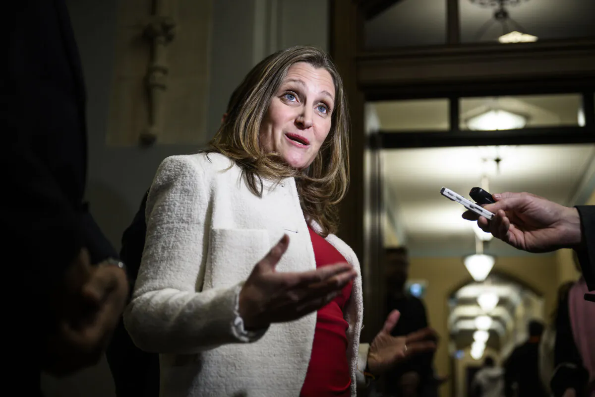 Liberal MP Chrystia Freeland, candidate for the leadership of the Liberal Party of Canada, answers questions from journalists as she makes her way to a meeting of the Liberal caucus, in West Block on Parliament Hill in Ottawa, on Jan. 23, 2025. (The Canadian Press/Justin Tang)