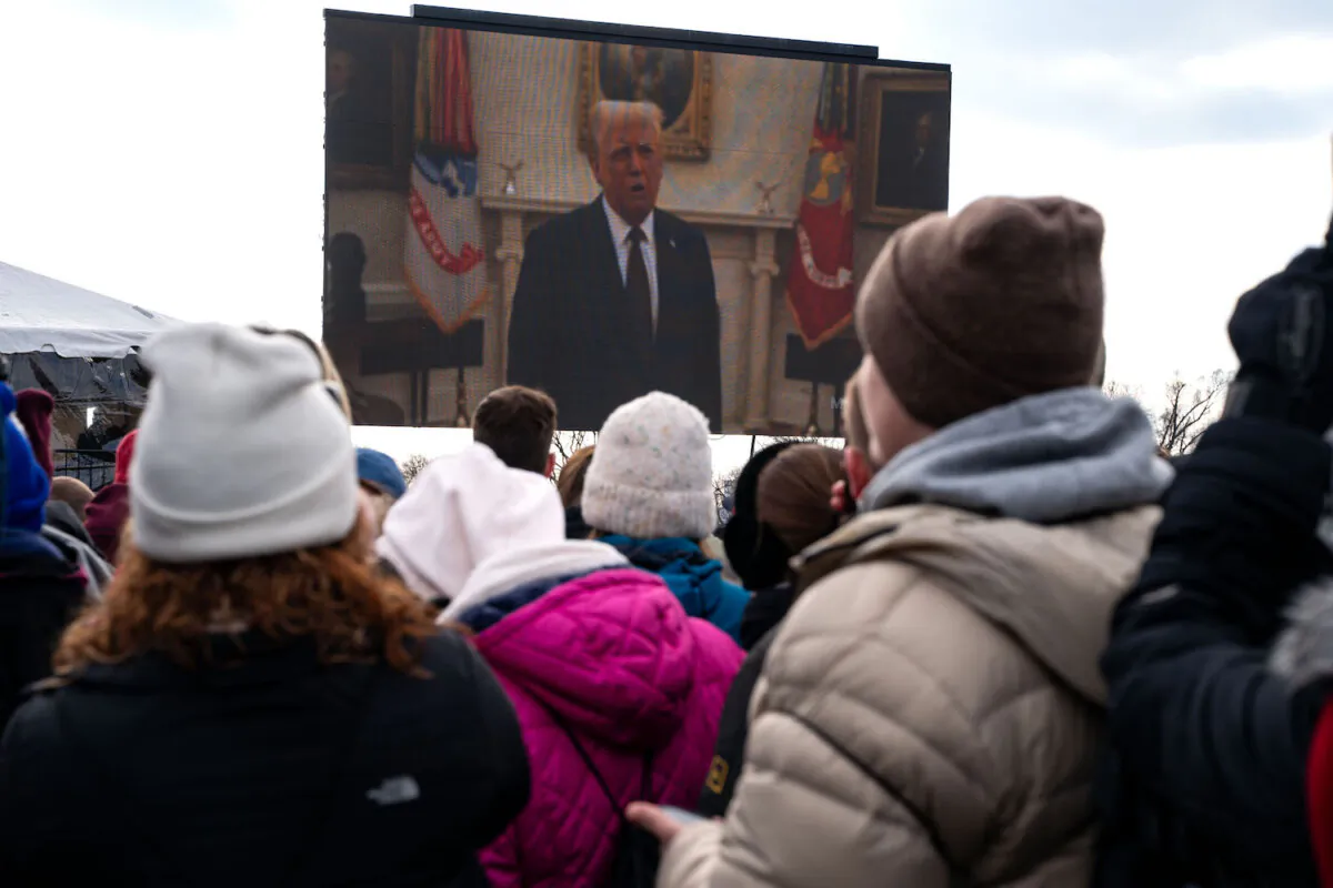 People attending the annual March for Life rally watch a pre-tapped video recording of President Donald Trump on the National Mall in Washington on Jan. 24, 2025. (Kent Nishimura/Getty Images)