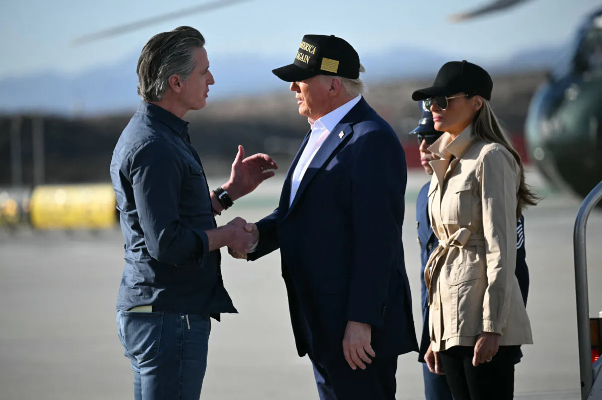 President Donald Trump shakes hands with California Gov. Gavin Newsom (L) upon arrival at Los Angeles International Airport in Los Angeles on Jan. 24, 2025. (Mandel Ngan/AFP via Getty Images)