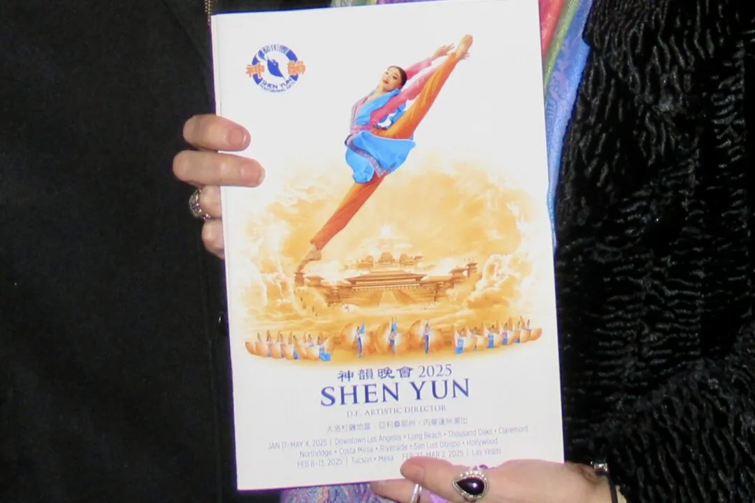 A copy of Shen Yun Performing Arts' program book for 2025. (Michael Ye/The Epoch Times)