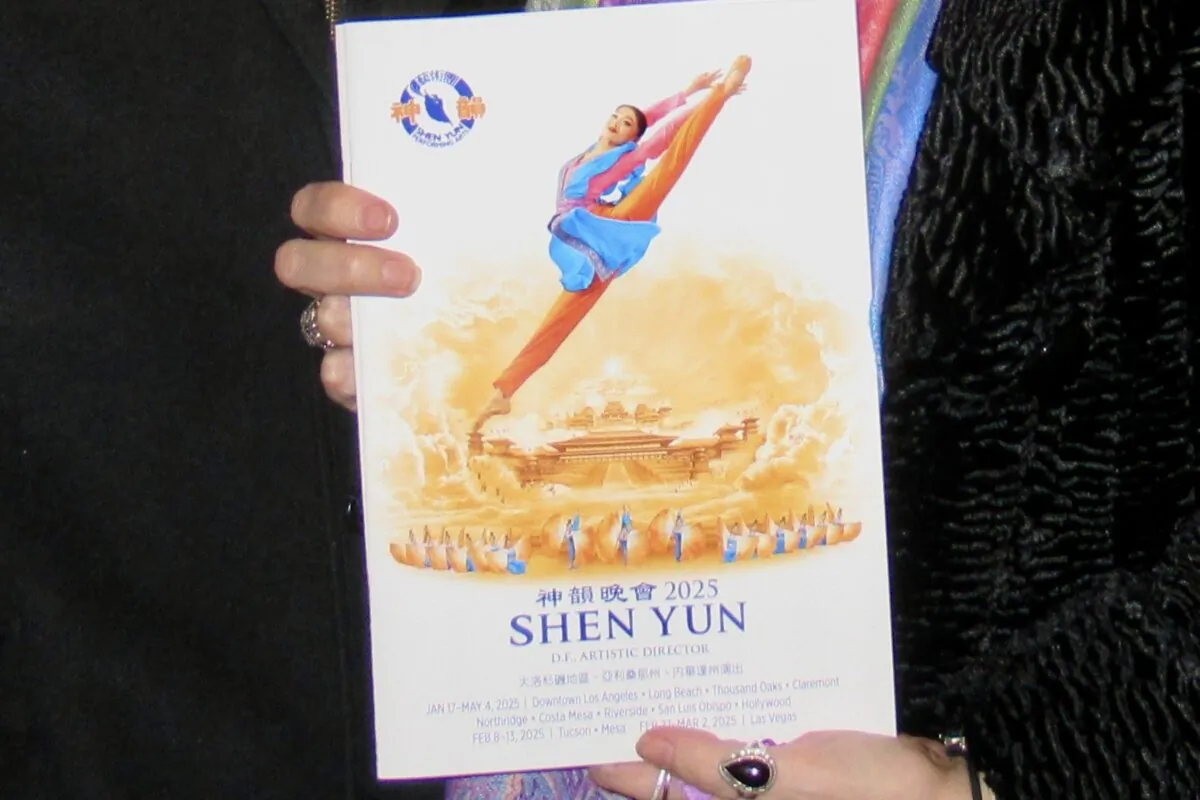 A copy of Shen Yun Performing Arts' program book for 2025. (Michael Ye/The Epoch Times)