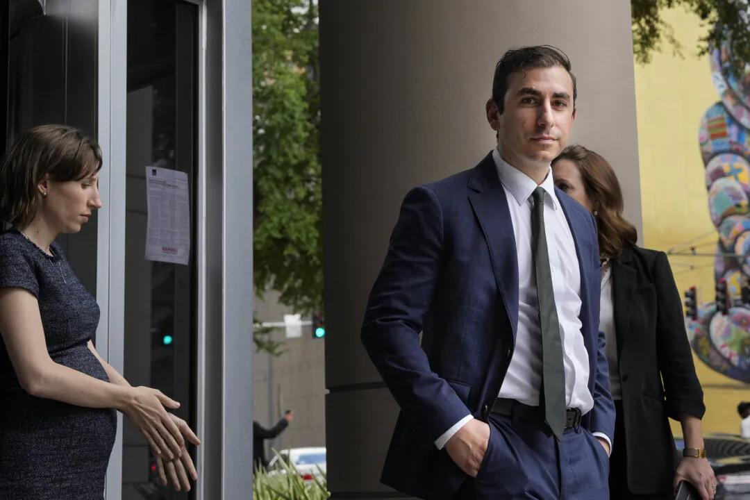 Dr. Eithan Haim (C) walks out of the Bob Casey United States Courthouse after appearing for an arraignment hearing in Houston on June 17, 2024. (Yi-Chin Lee/Houston Chronicle via AP, File)
