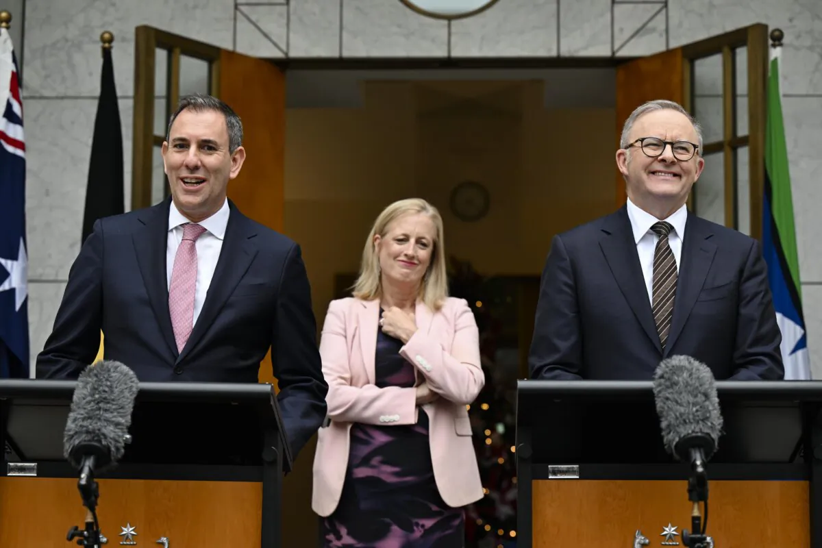 Australian Labor Treasurer Jim Chalmers, Finance Minister Katy Gallagher (C), and Prime Minister Anthony Albanese speak to the media during a press conference at Parliament House in Canberra, Australia on Nov. 29, 2024. (AAP Image/Lukas Coch)
