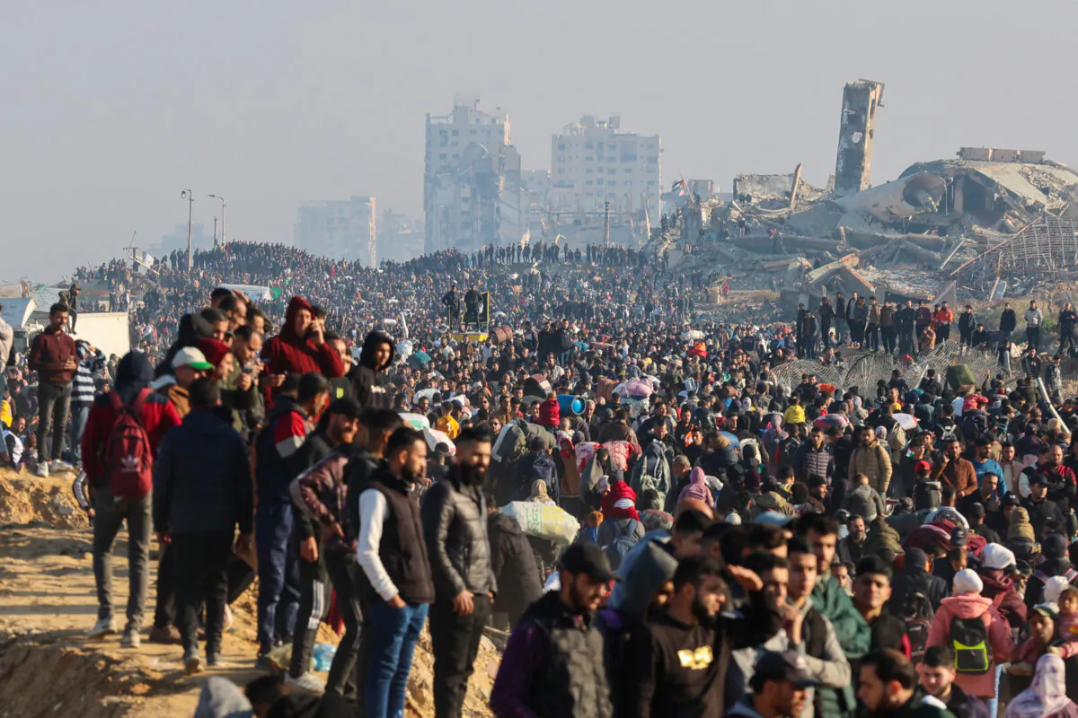 Displaced Gazans cross the Netzarim corridor from the southern Gaza Strip into Gaza City on Jan. 27, 2025. (Omar aL-Qattaa/AFP via Getty Images)