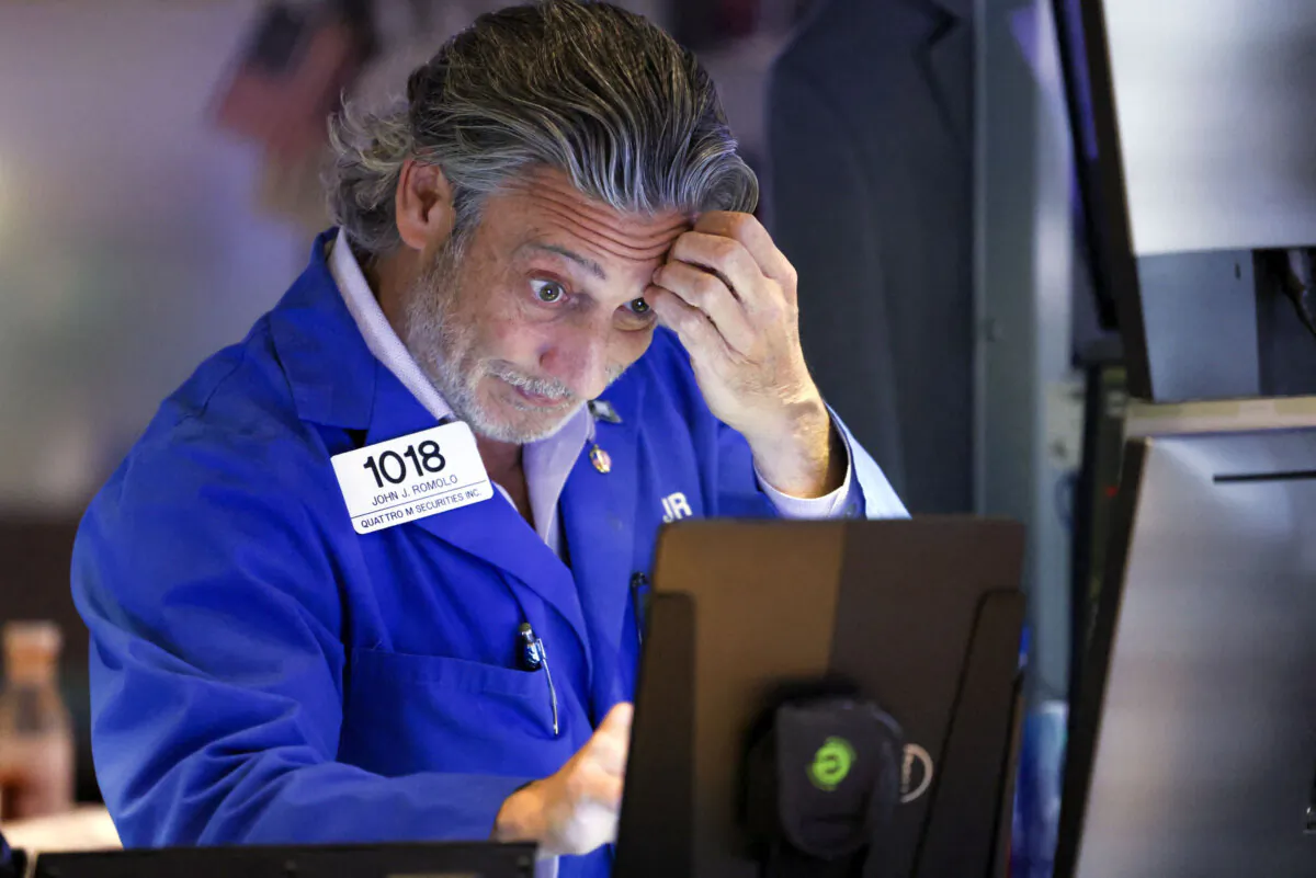 A trader works on the floor of the New York Stock Exchange ahead of the closing bell on Aug. 5, 2024. (Charly Triballeau/AFP via Getty Images)