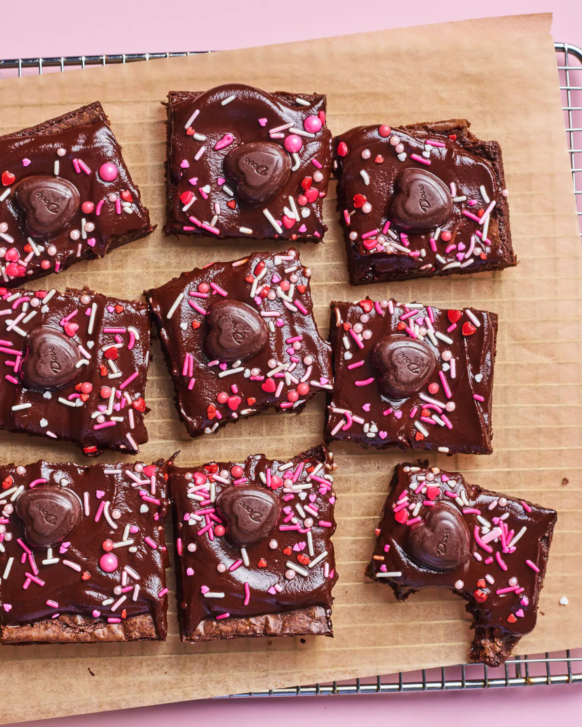These triple-chocolate brownies are covered in ganache and topped with dark chocolate hearts. (Joe Lingeman/TCA)