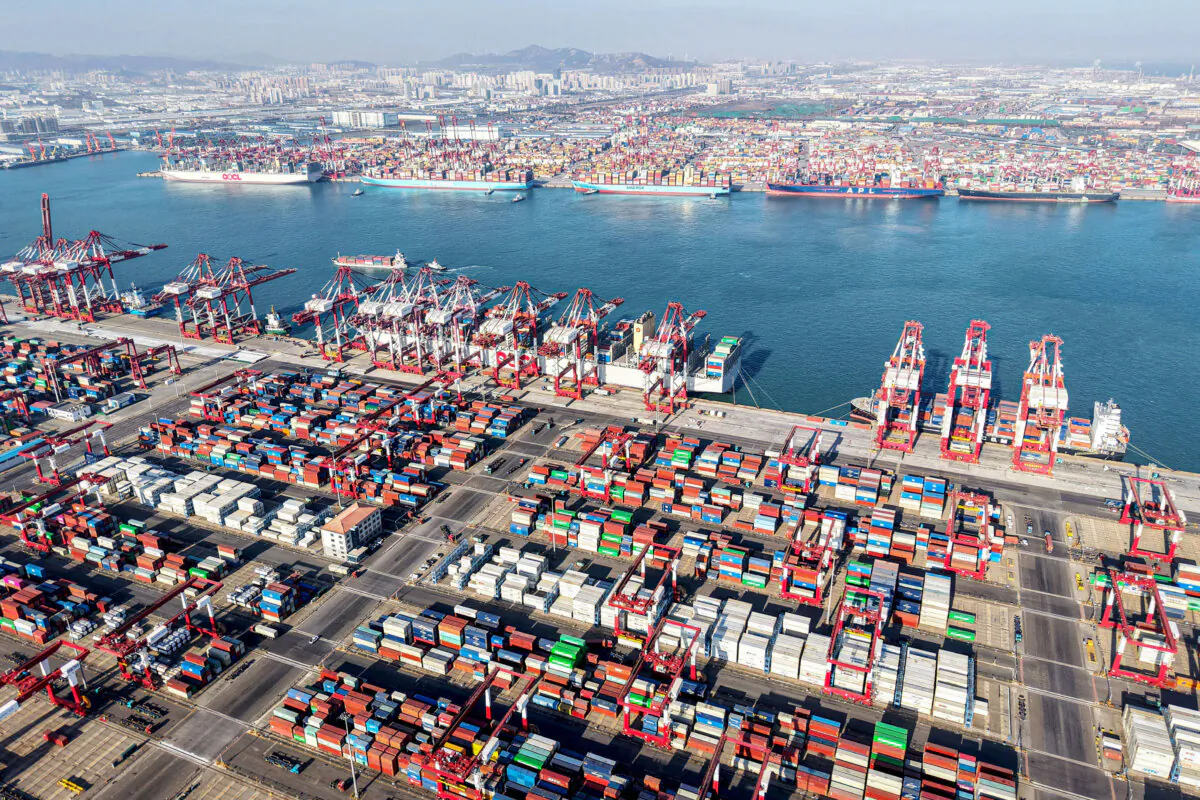 Shipping containers and gantry cranes at Qingdao port in Qingdao, in eastern China's Shandong Province, on Dec. 26, 2024. (STR/AFP via Getty Images)