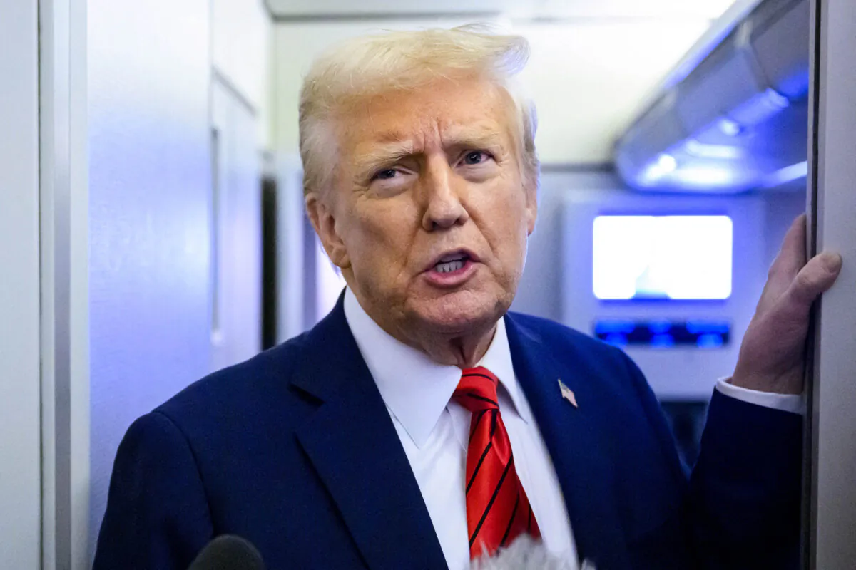 President Donald Trump speaks to reporters while in flight on Air Force One en route Joint Base Andrews in Maryland on Jan. 27, 2025. (Mandel Ngan/AFP via Getty Images)