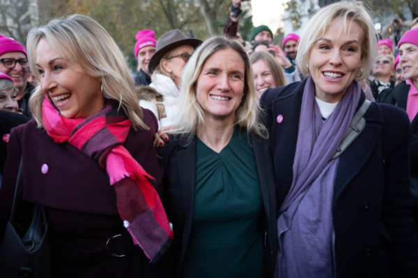 Kim Leadbeater (centre) is joined by campaigner and cancer sufferer Sophie Blake (left) and Rebecca Wilcox daughter of Esther Rantzen Rebecca Wilcox (right) after hearing the result of the vote in parliament for her Terminally Ill Adults (End of Life) Bill in Westminster, London, England, on Nov. 29, 2024. (Stefan Rousseau/PA Wire)